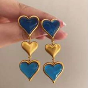 Blue Dangle Hearts Earrings